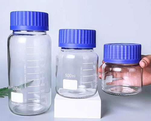 Clear Glass Laboratory Reagent Bottles with Blue Caps
